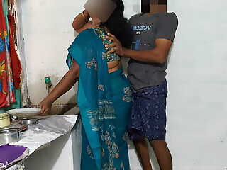 Aunty was cleaning the dishes in the kitchen wearing a saree increased by I went behind her increased by tied her up increased by had sex in all directions her.